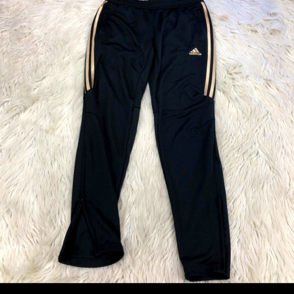 Adidas black with gold stripes